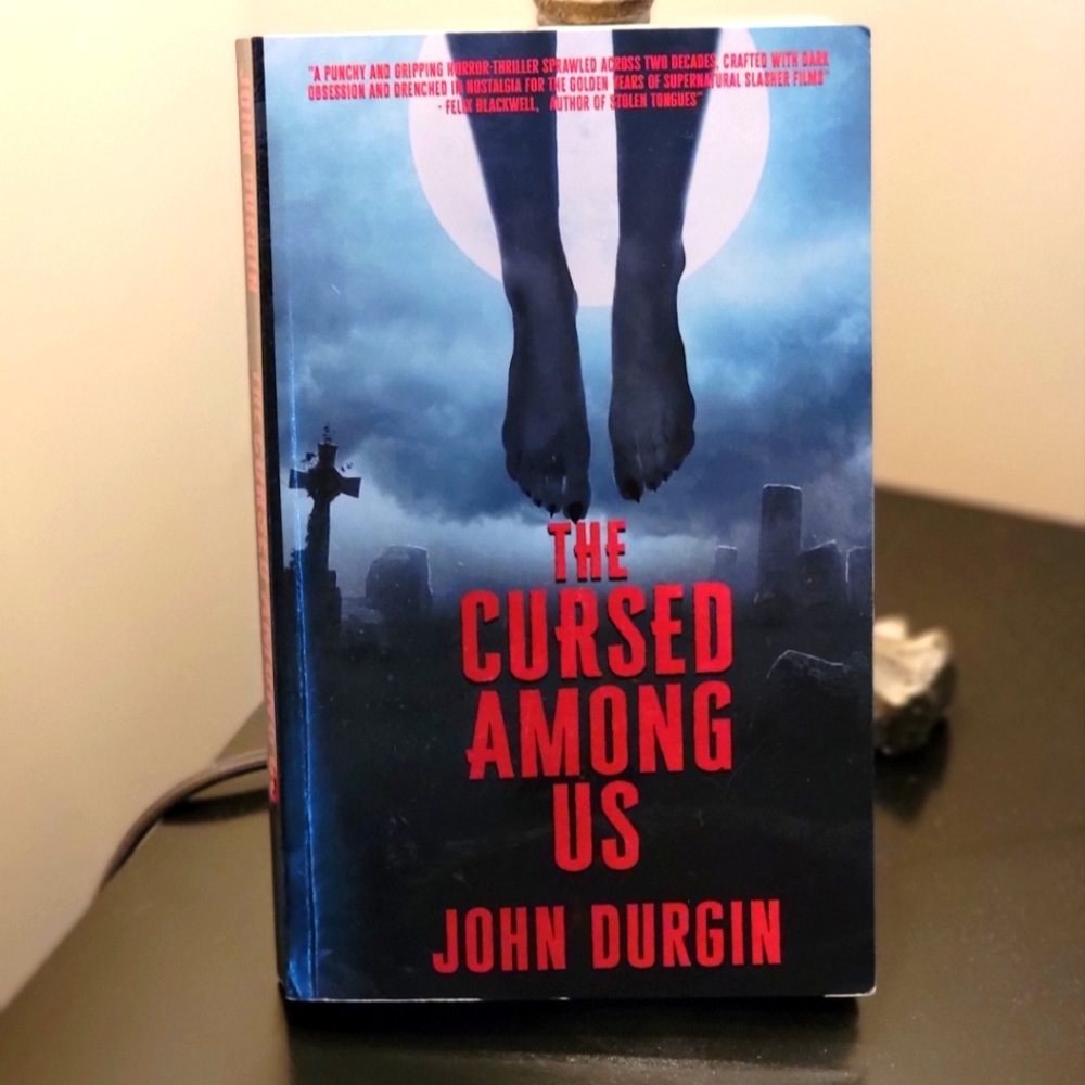 The Cursed Amoung Us book